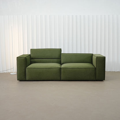 Cubix fabric adjustable backrest sofa in green pet friendly fabric, photo taken on the fabric floor