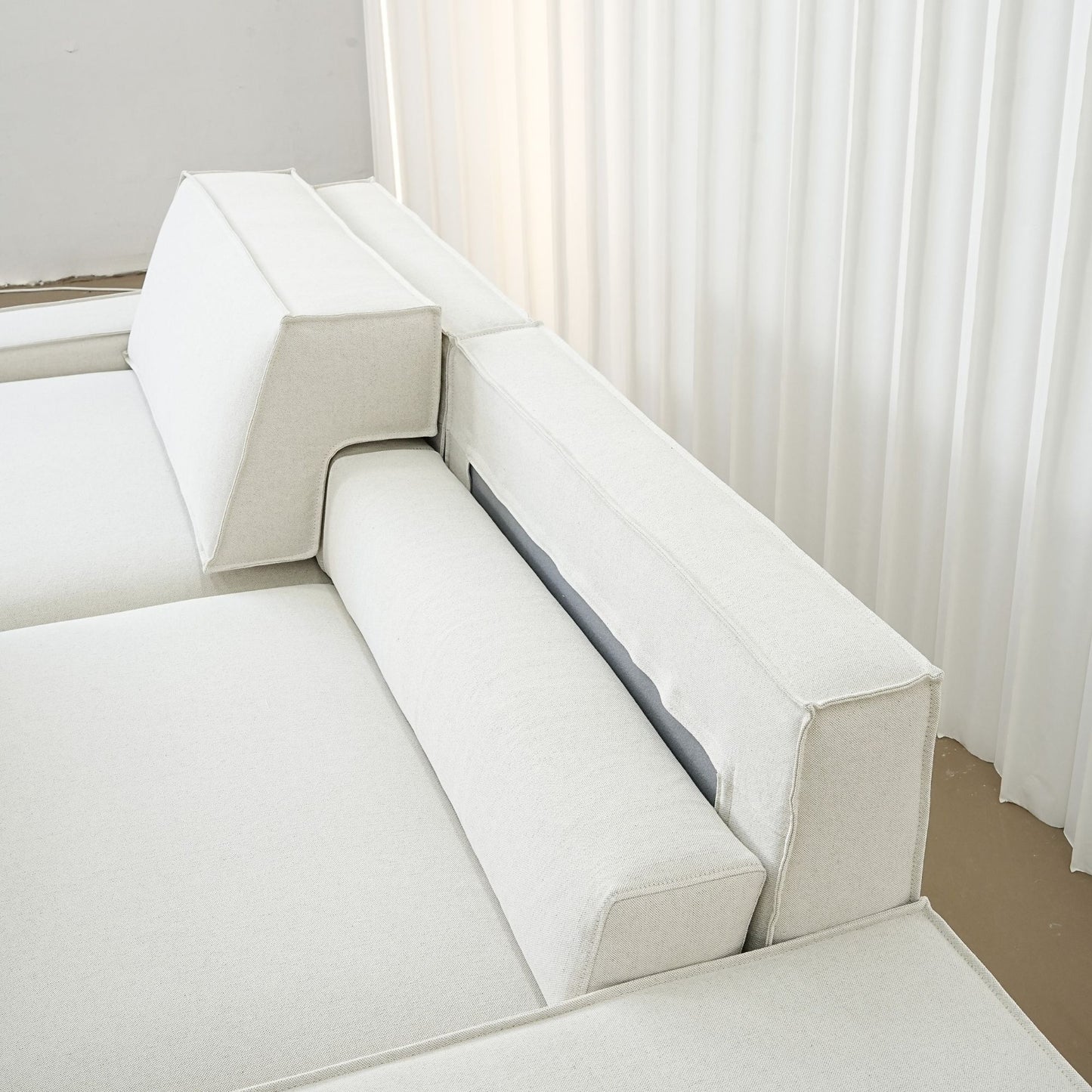 Photo showing how the adjustable backrest portion for the Cubix adjustable backrest sofa works 