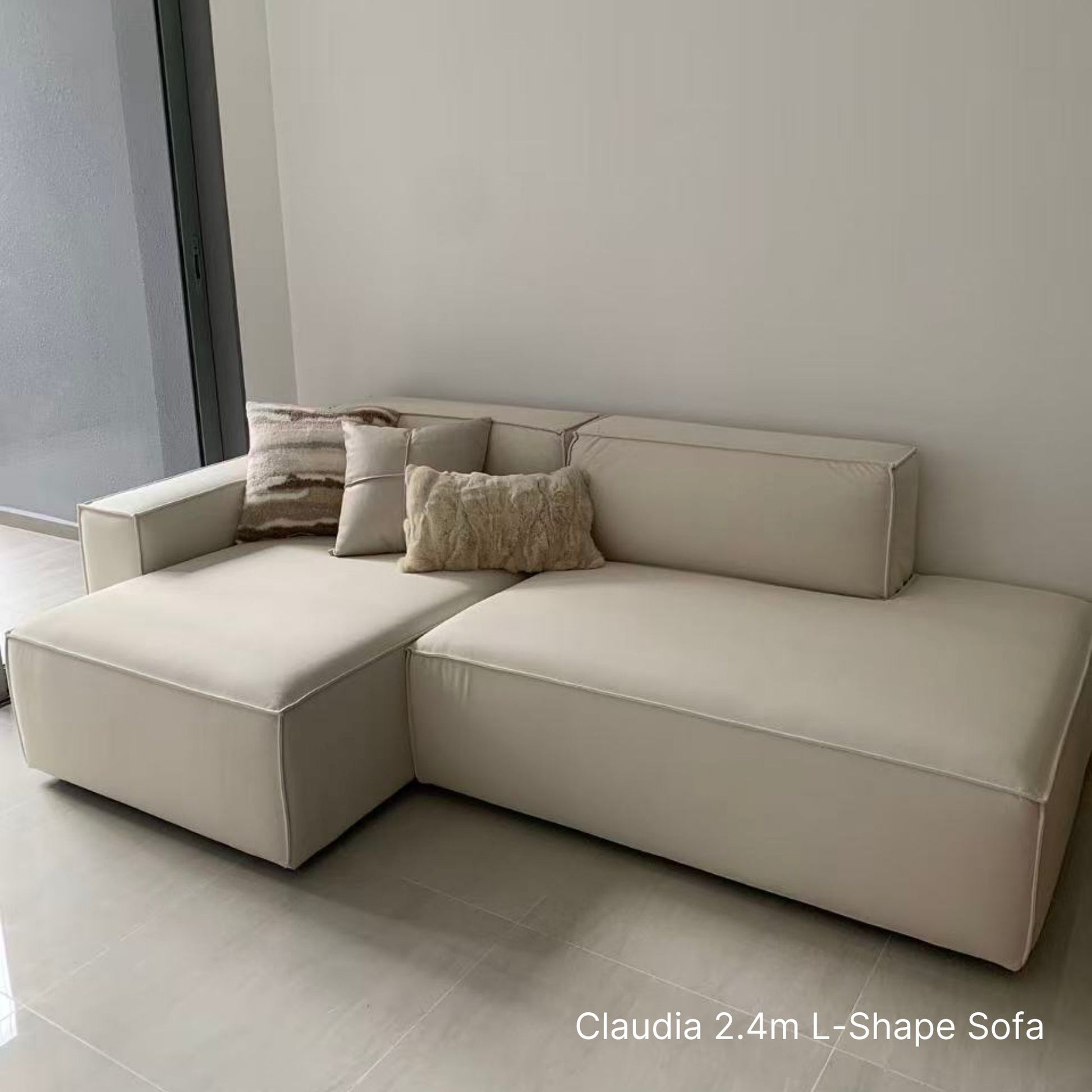 Sample Cubix L-shaped sectional sofa with left chaise at 240cm in white pet friendly fabric in our customer's living room
