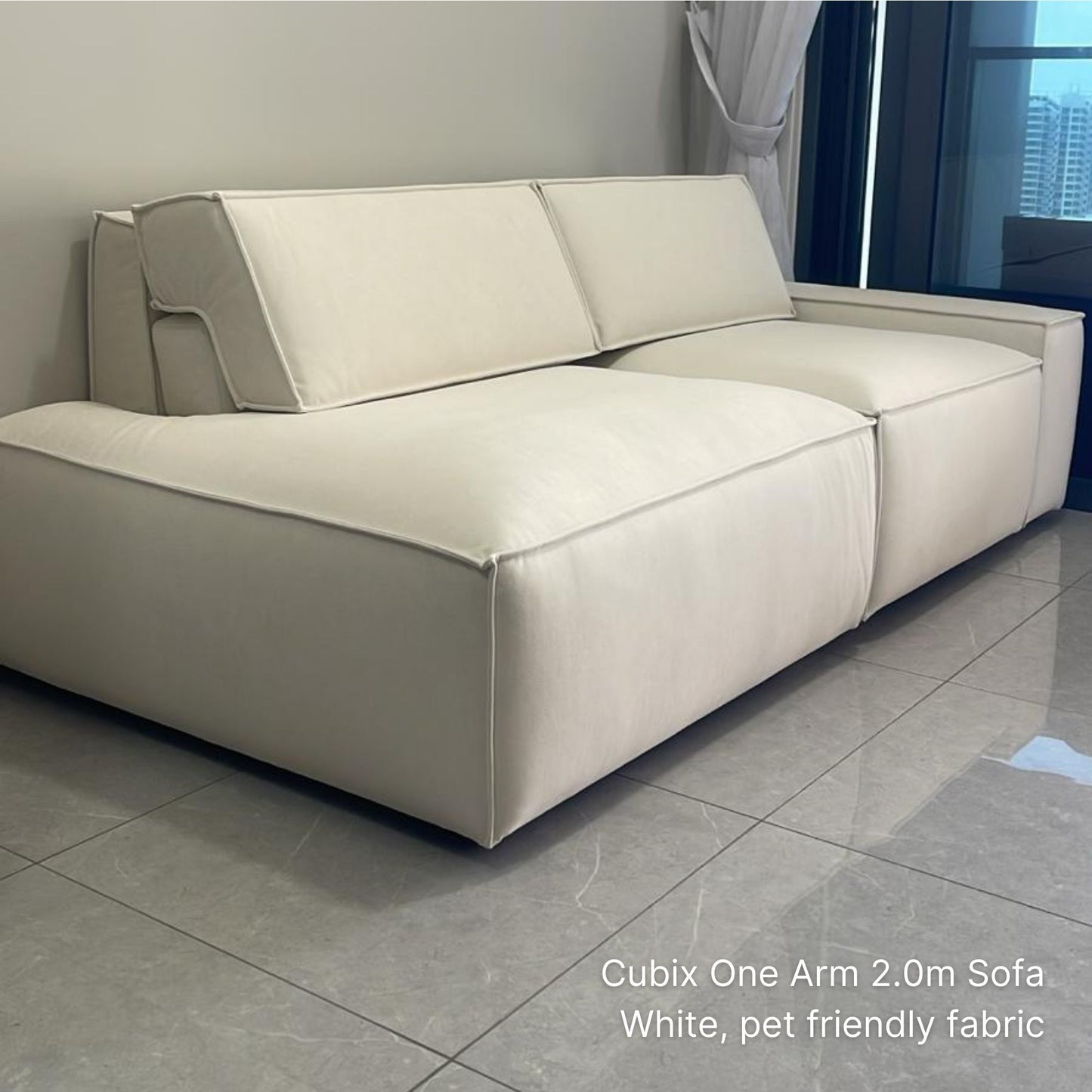sample 3 seater Cubix one arm sofa with white pet friendly fabric