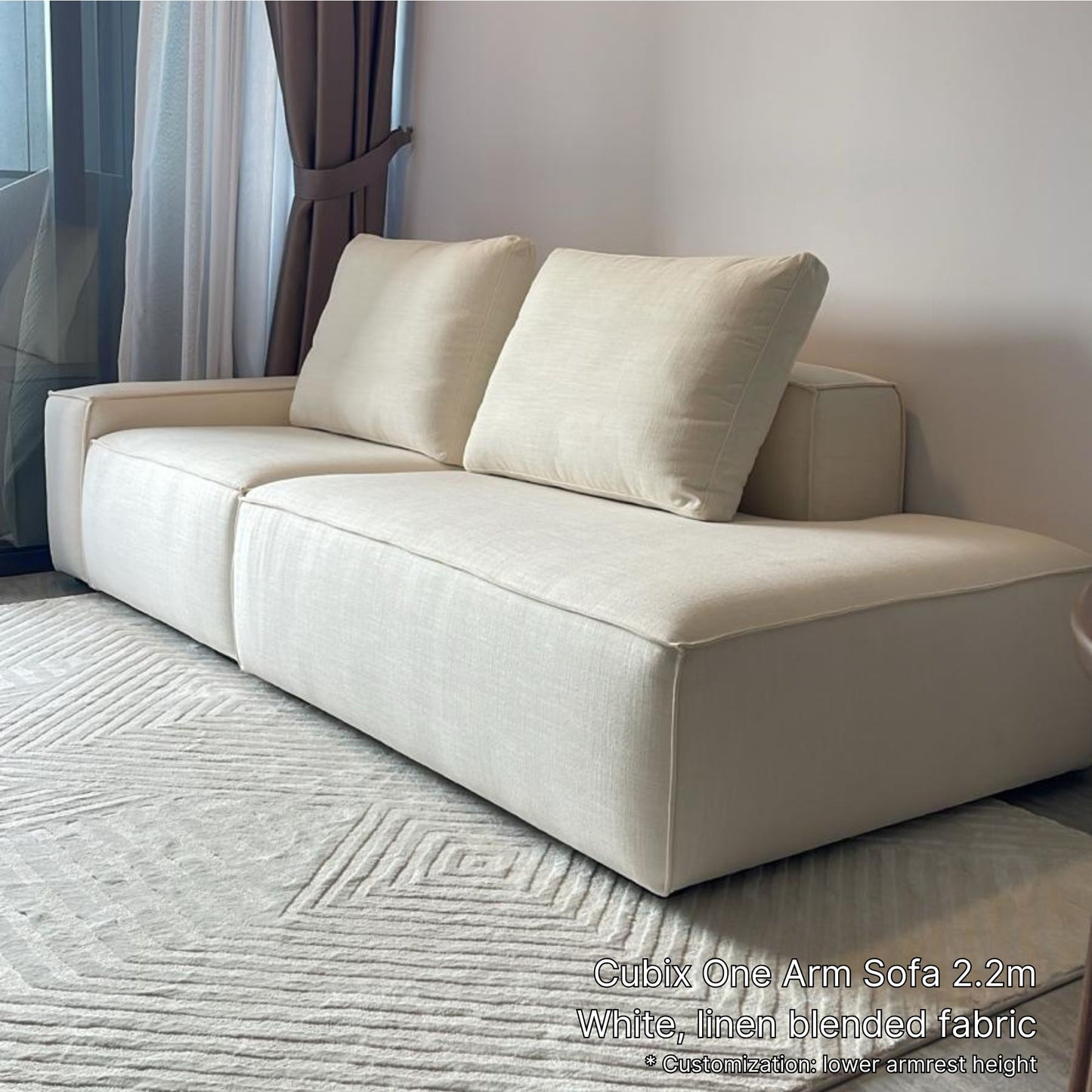220cm 3 seater Cubix fabric one arm sofa with left arm in white in customer's living room with white rug