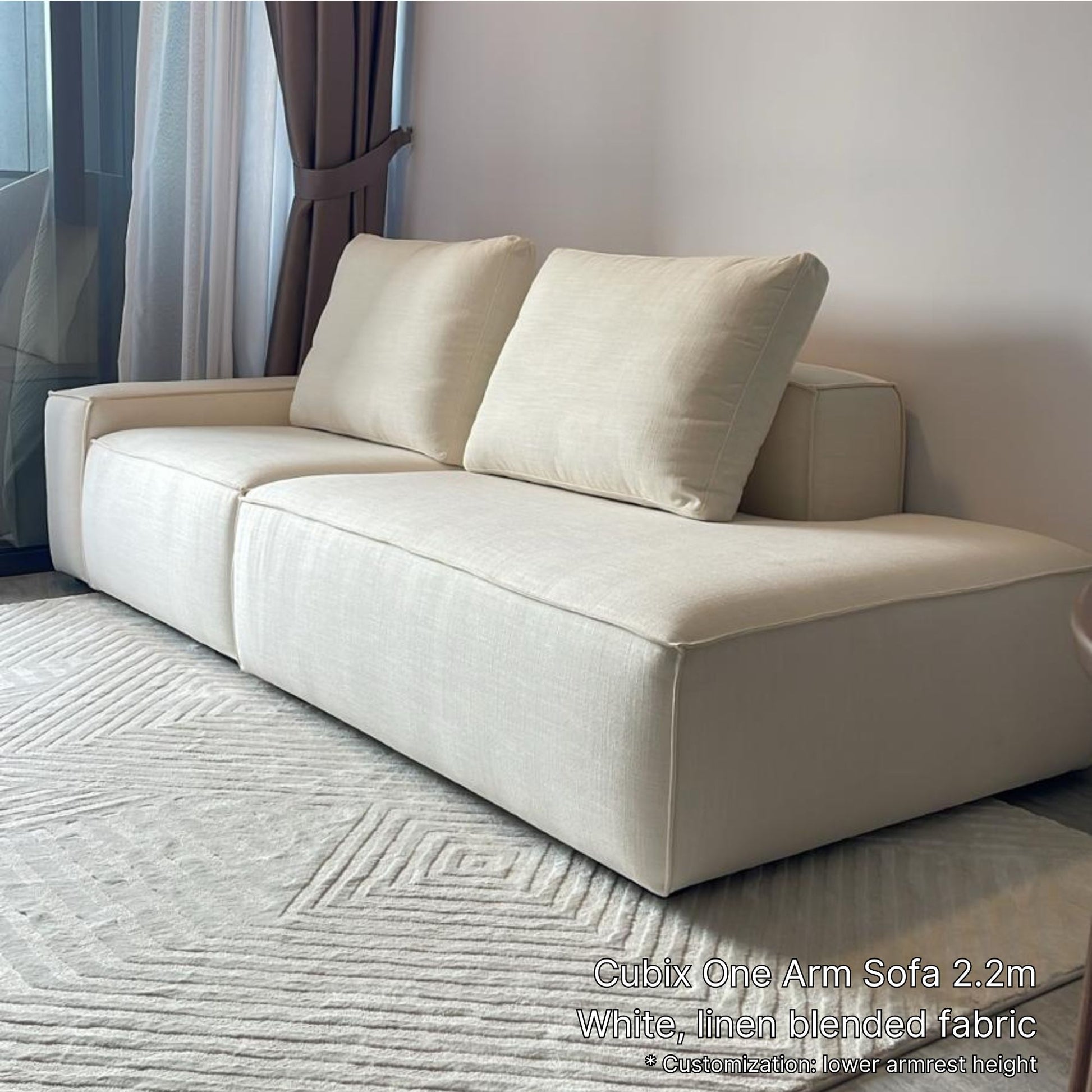 220cm 3 seater Cubix fabric one arm sofa with left arm in white in customer's living room with white rug