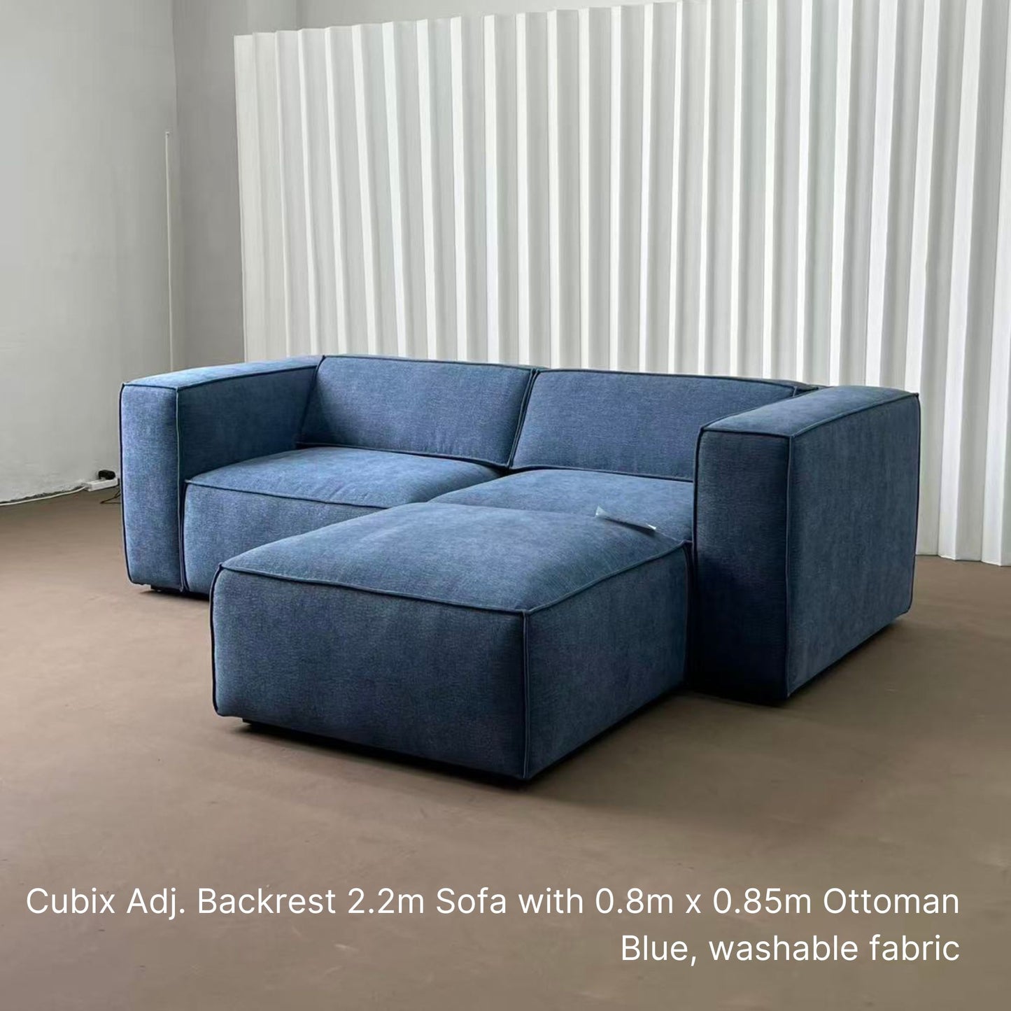 Sample Cubix fabric ottoman at 80cm x 85cm paired with 3 seater 220cm Cubix fabric adjustable backrest sofa in blue washable fabric