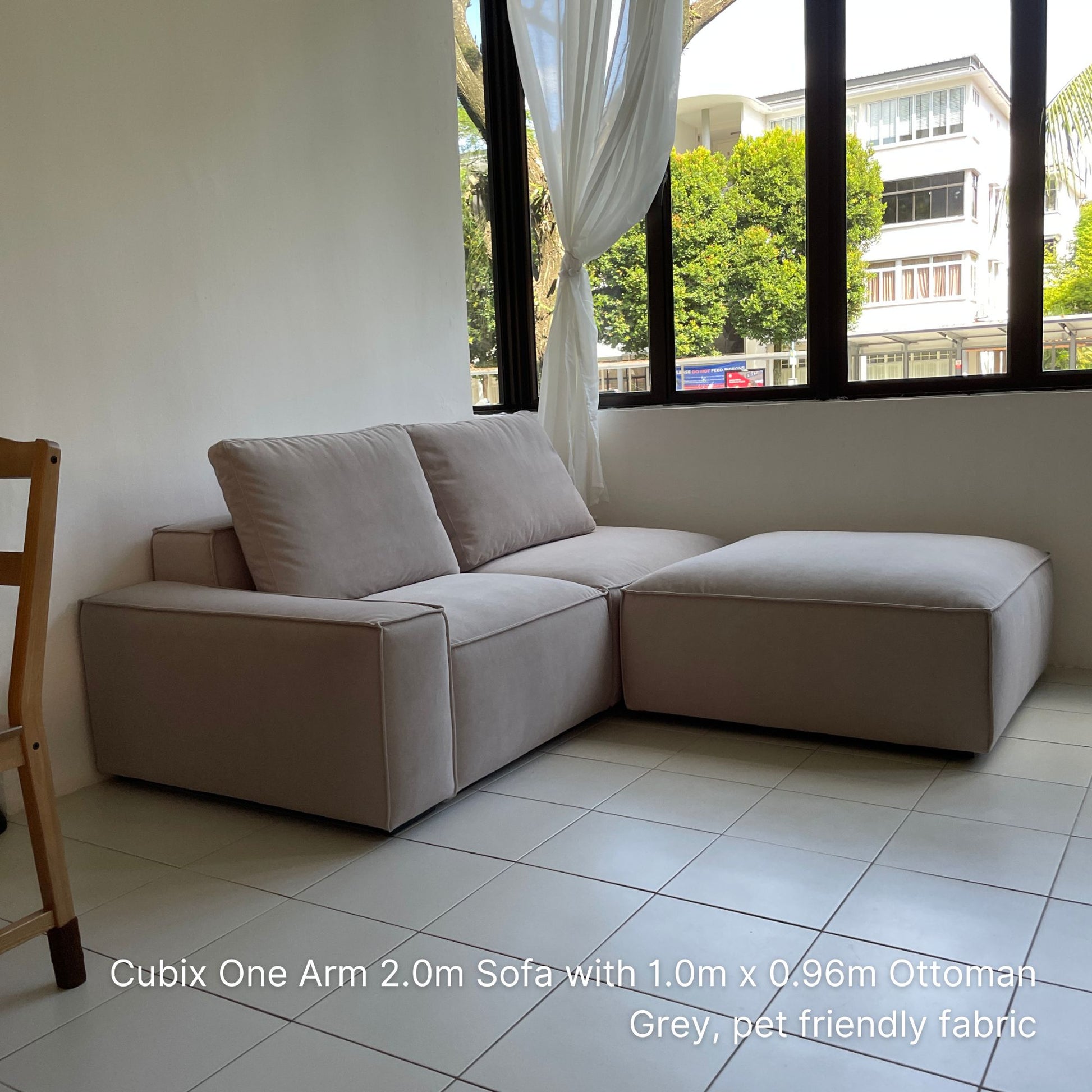 Sample 100cm x 96cm Cubix fabric ottoman paired with Cubix fabric one arm sofa at 200cm in our customer's living room