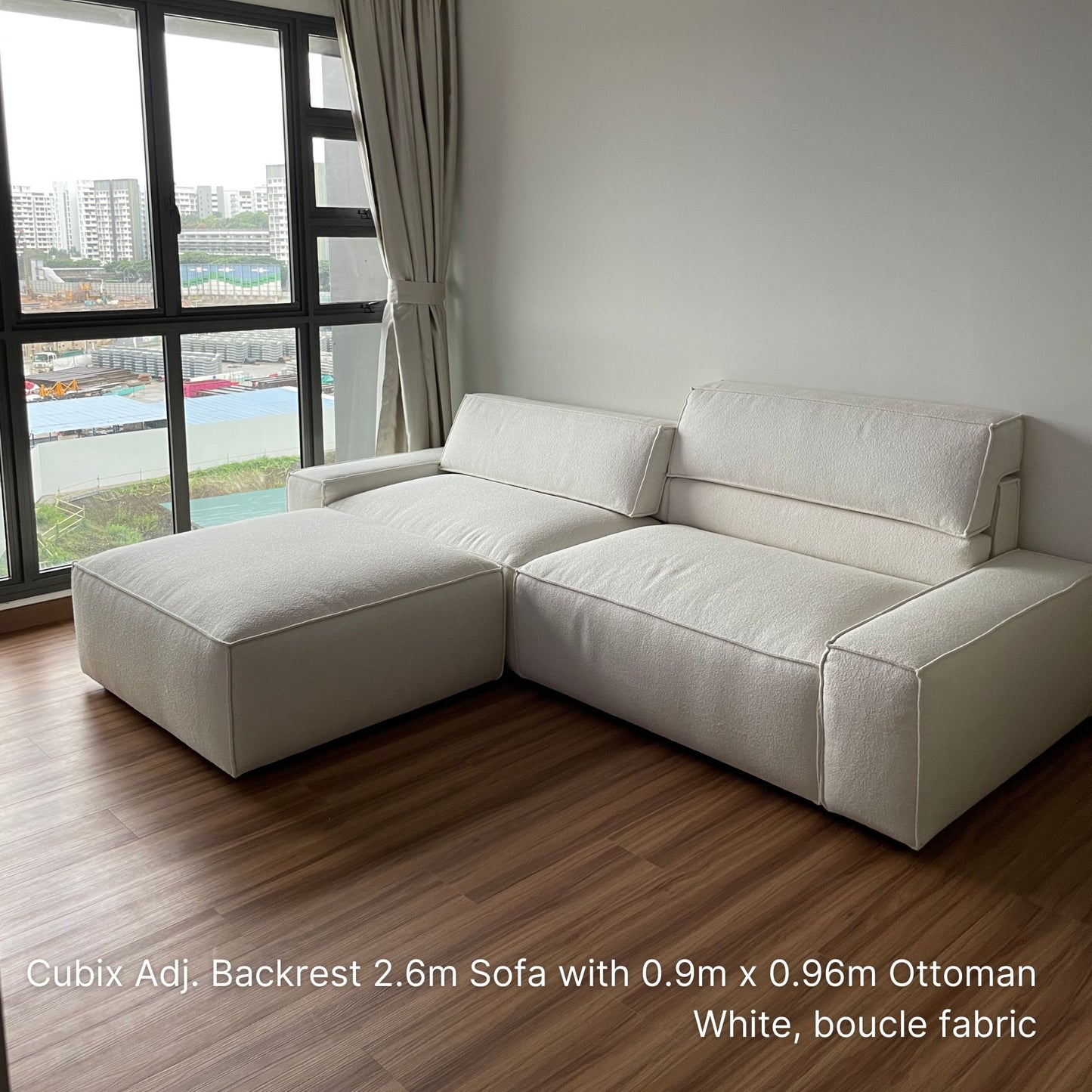 Sample cubix ottoman at 90cm x 96cm in white boucle fabric paired with a 4 seater Cubix adjustable backrest sofa