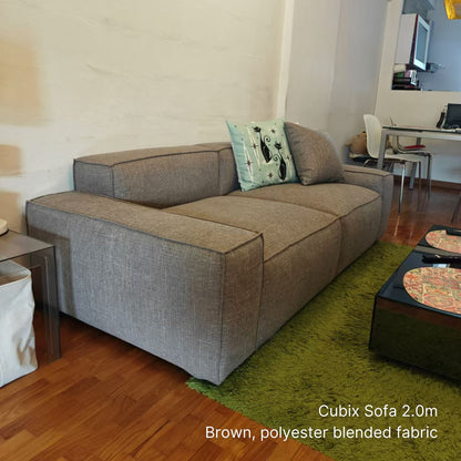 Delivered 3 seater Cubix fabric sofa in our customers living room in brown with green rug and white walls