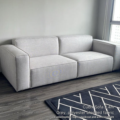 Delivered 3 seater 240cm Cubix grey fabric sofa in our customer's living room with black and white patterned rug next to window