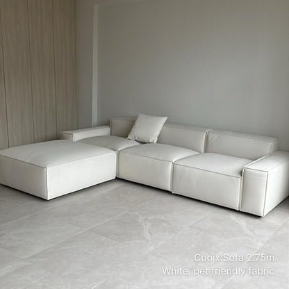 Delivered 4 seater Cubix sofa at 275cm with matching ottoman in white pet friendly fabric in our customer's living room