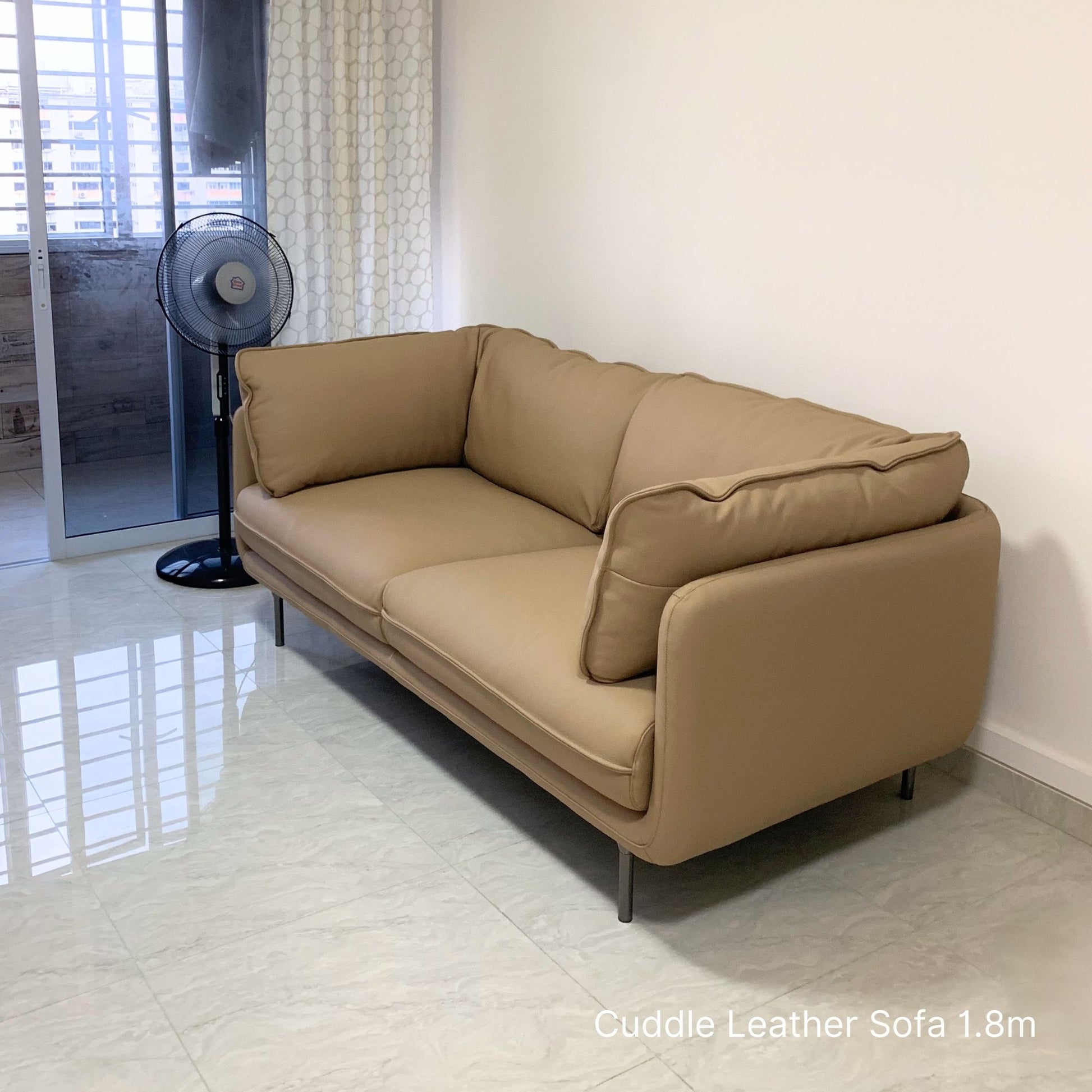 Cuddle beige leather sofa sample at 180cm