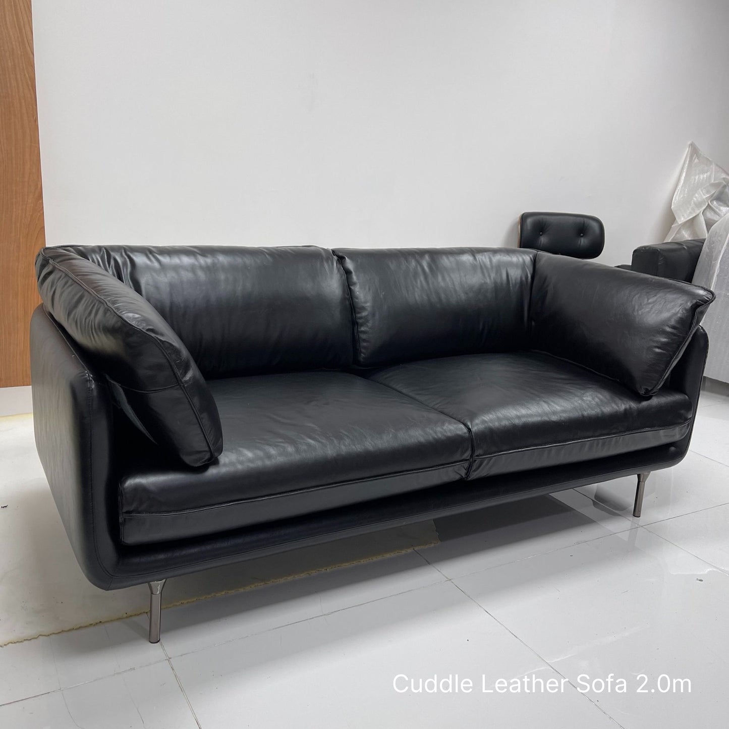 Cuddle 3 seater black leather sofa sample at 200cm 