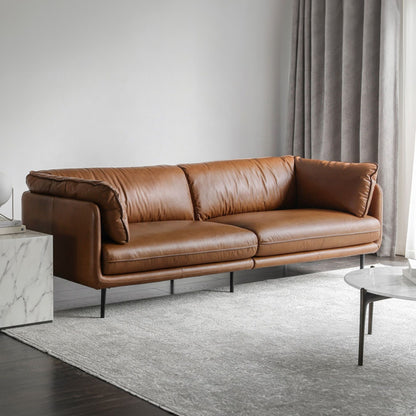 Cuddle brown leather sofa diagonal view photo shoot