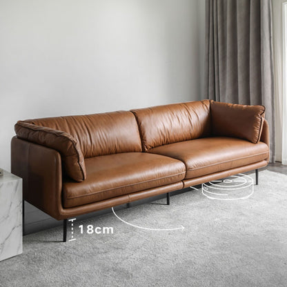 18cm leg height for Cuddle leather sofa in brown top grain leather, indicating that it is easy for robot cleaner to clean underneath