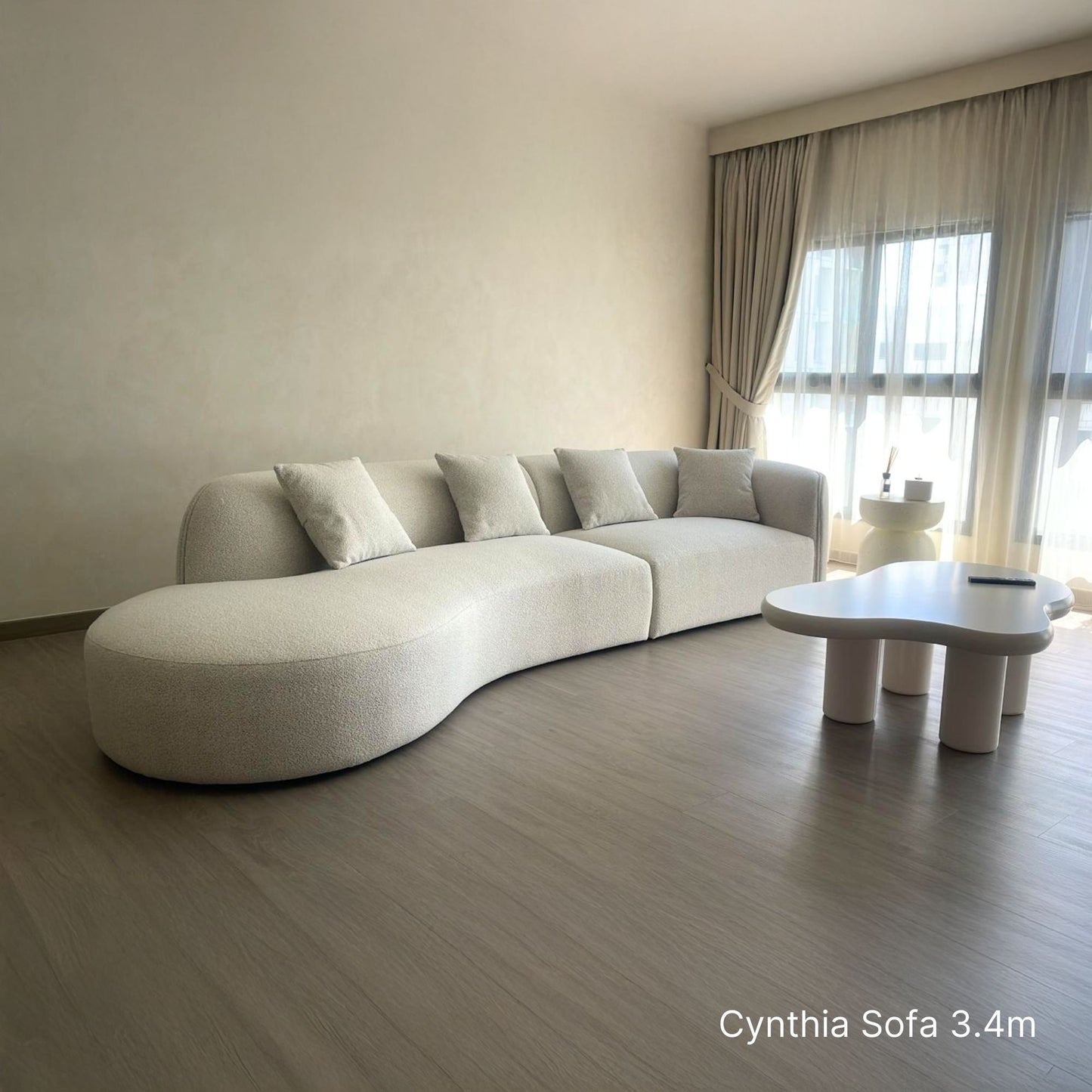 Sample real delivery of 6 seater Cynthia fabric one arm sofa with right arm at 340cm in white boucle fabric
