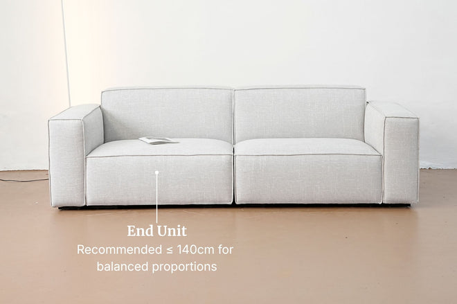 Illustration of end unit module on a straight 2 module Cubix fabric sofa in grey