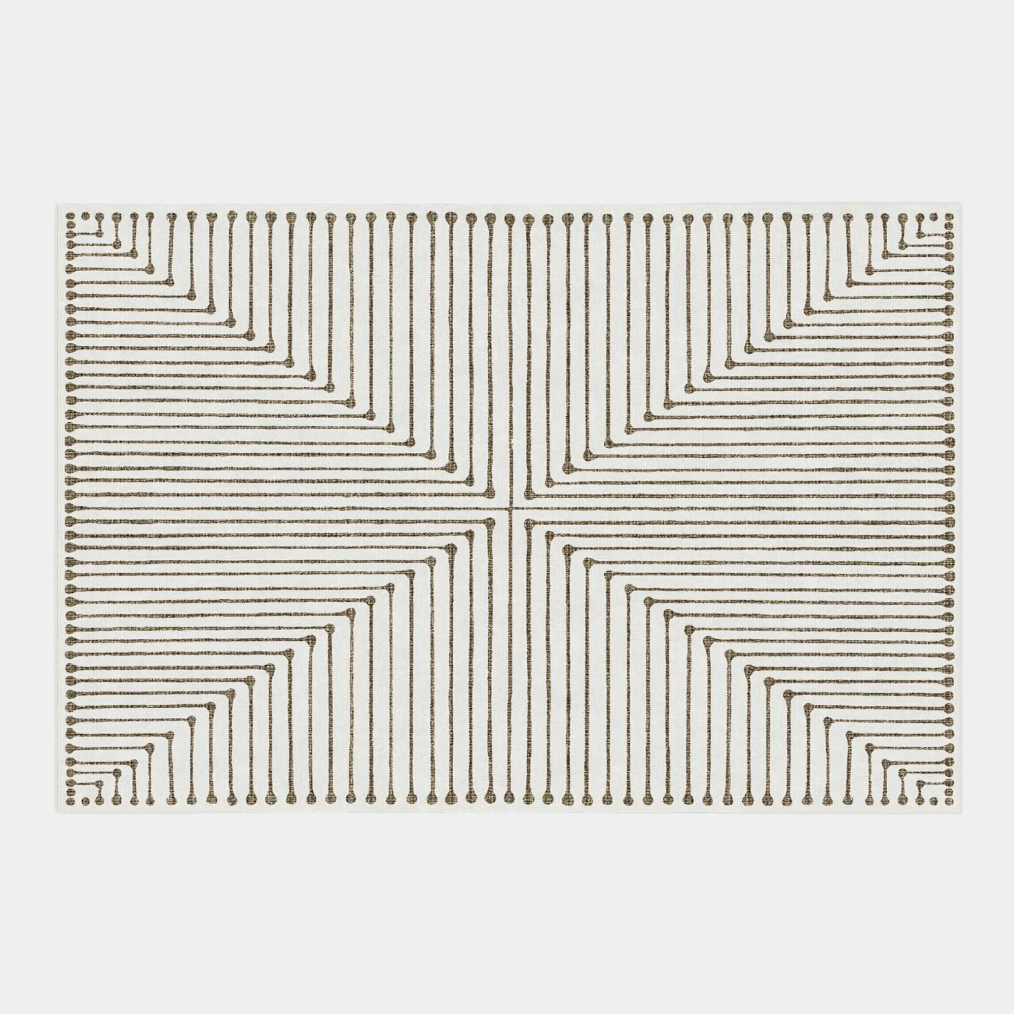Inkdrop design beige coloured rug