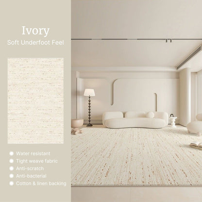 Modern interior with a white rug and furniture, featuring text about the rug's properties.