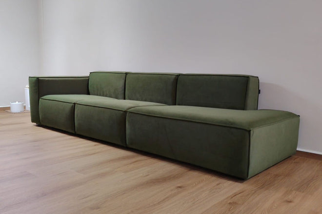 cubix one arms sofa with peninsula unit as the armless end in green pet friendly fabric