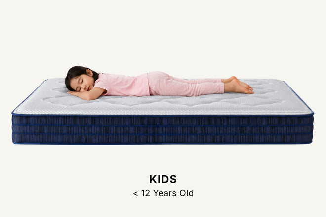 Kid on snow mattress