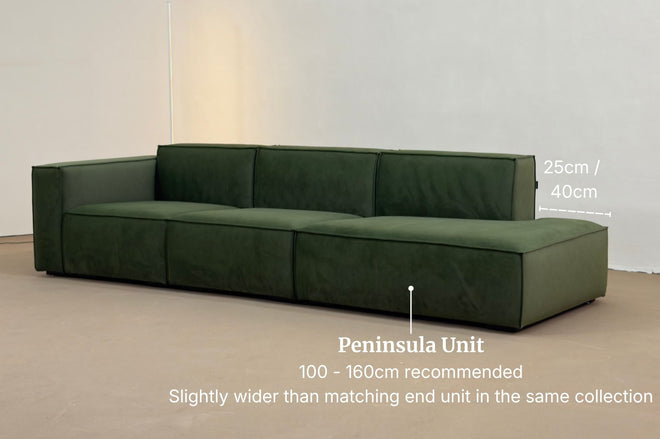 Example of a peninsula unit with an open end used in Cubix fabric one arm sofa in green pet friendly fabric