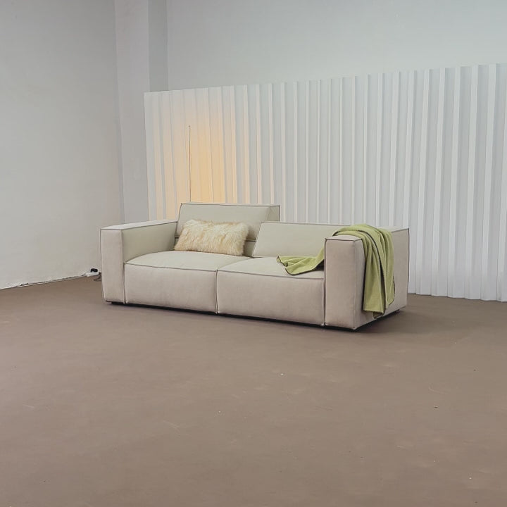 video showcase of how the adjustable backrest works and other features such as removable covers and thick armrests