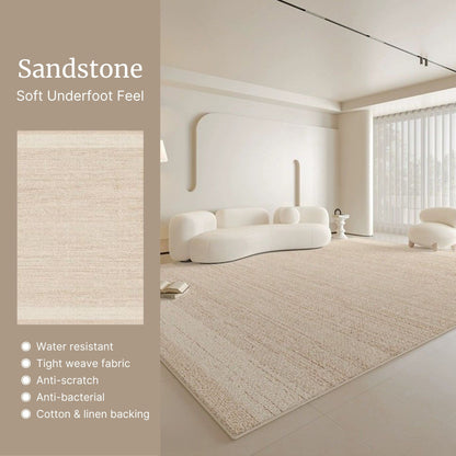 Beige rug in a modern living room with sandstone color swatch and features listed.