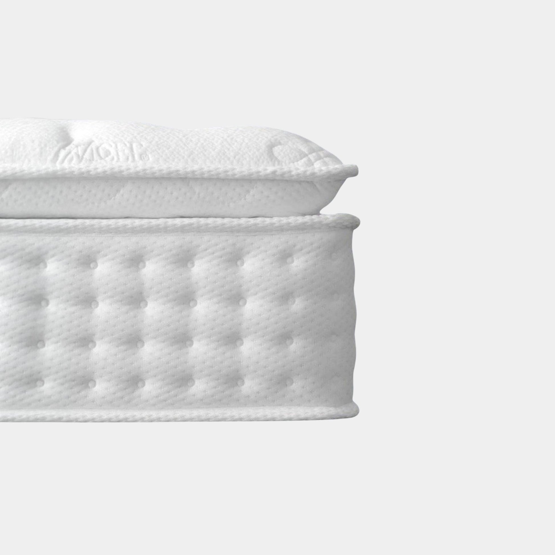 White mattress on a white background