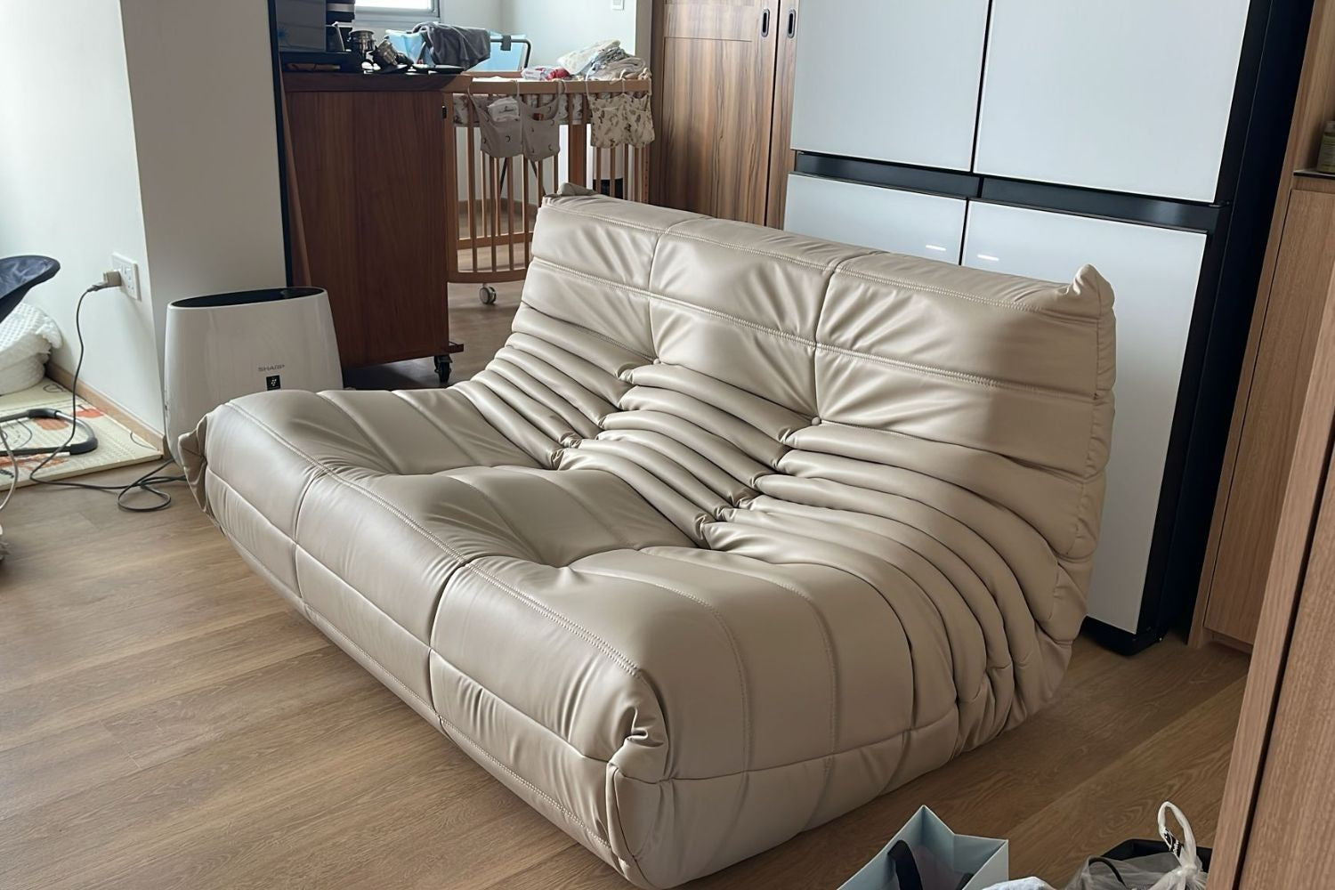 Caterpillar 131cm beige faux leather sofa
