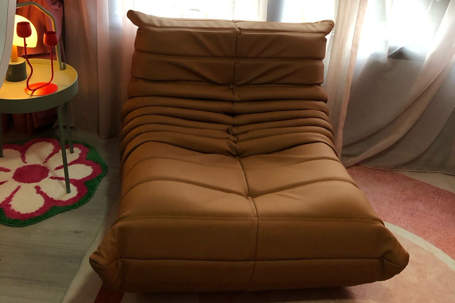 Caterpillar brown faux leather lounge chair