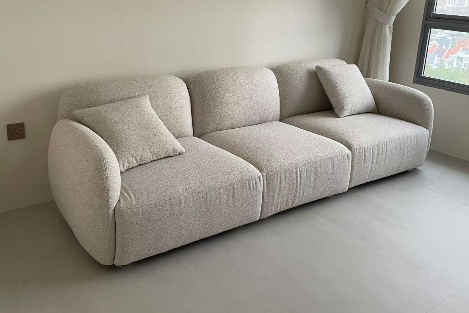 Charmy 4 seater beige boucle fabric sofa
