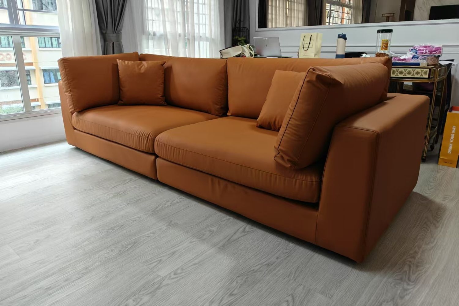 Claudia 4 seater brown faux leather sofa