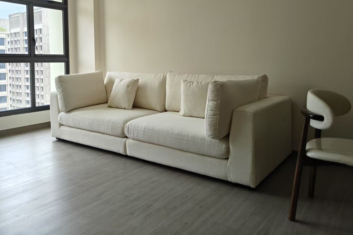 Claudia 4 seater white fabric sofa