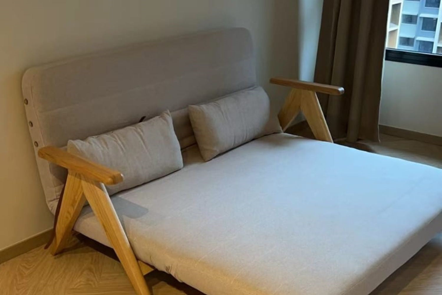 Corona 165cm beige fabric sofa bed