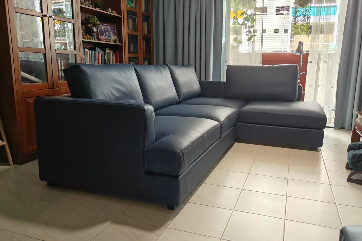 Crescent dark blue faux leather L shape sectional sofa