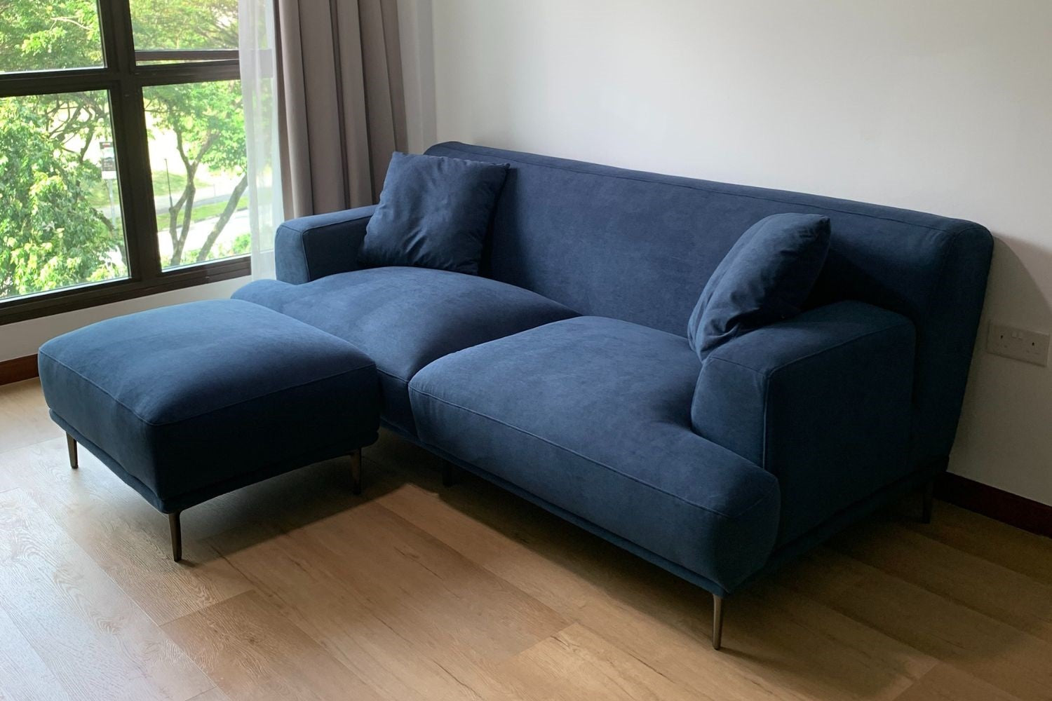 Crystal 3 seater 210cm dark blue fabric sofa + ottoman in customer's home