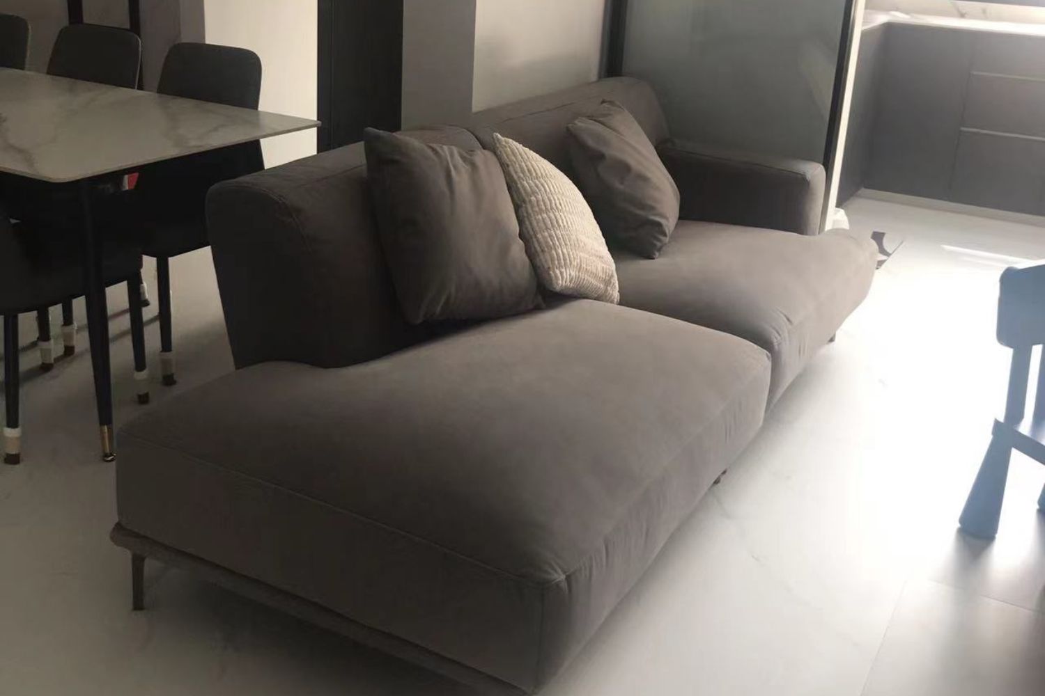 Crystal 240cm grey one arm sofa in customer's living room