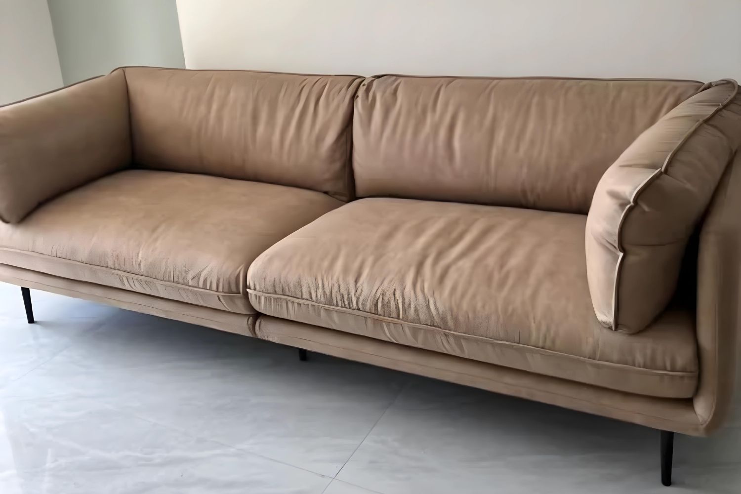 Cuddle brown fabric sofa in customer's home