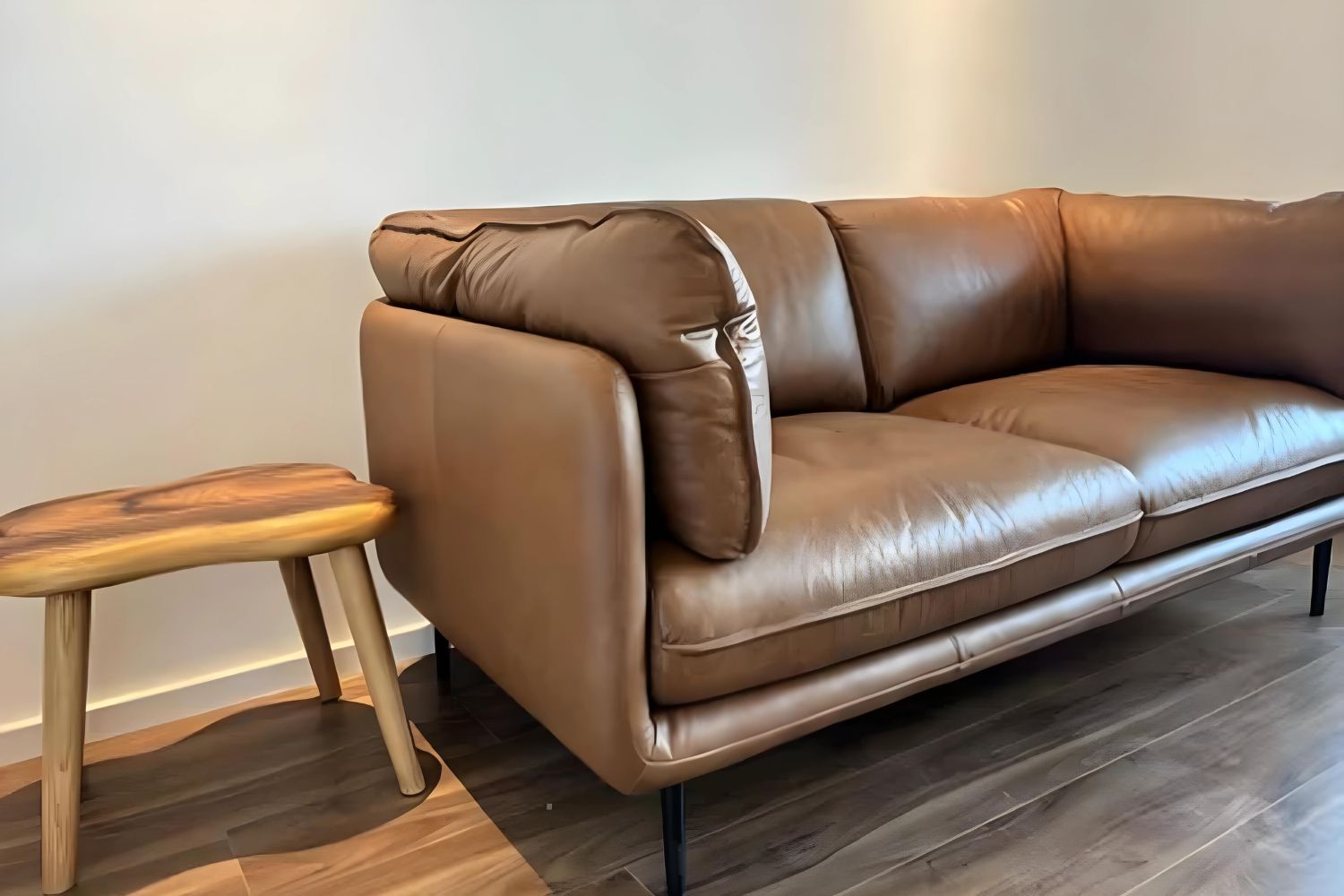 Cuddle brown half leather sofa in customer's home