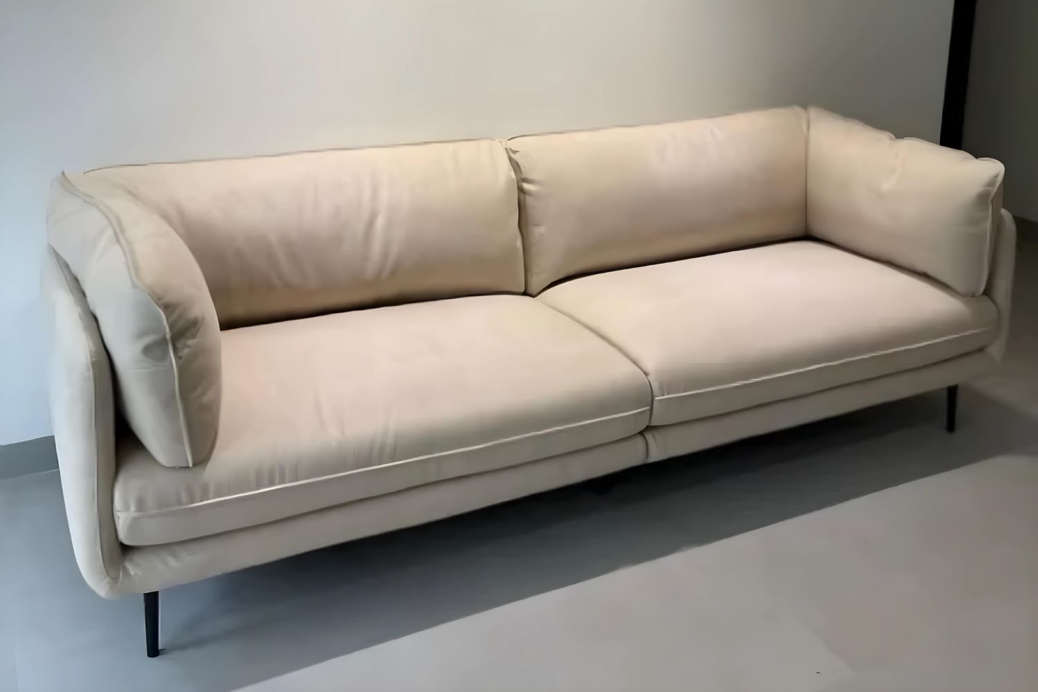 Cuddle white fabric sofa in customer's home