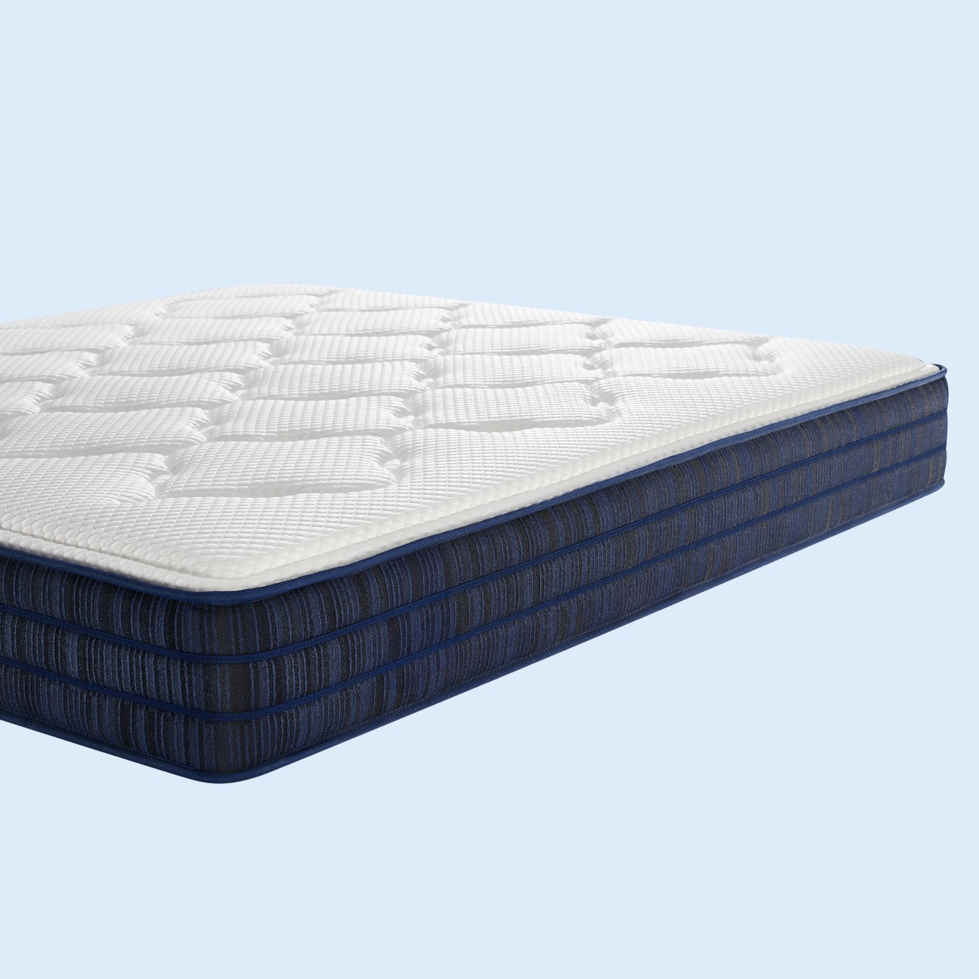 Mattress with white top and blue base on a light blue background