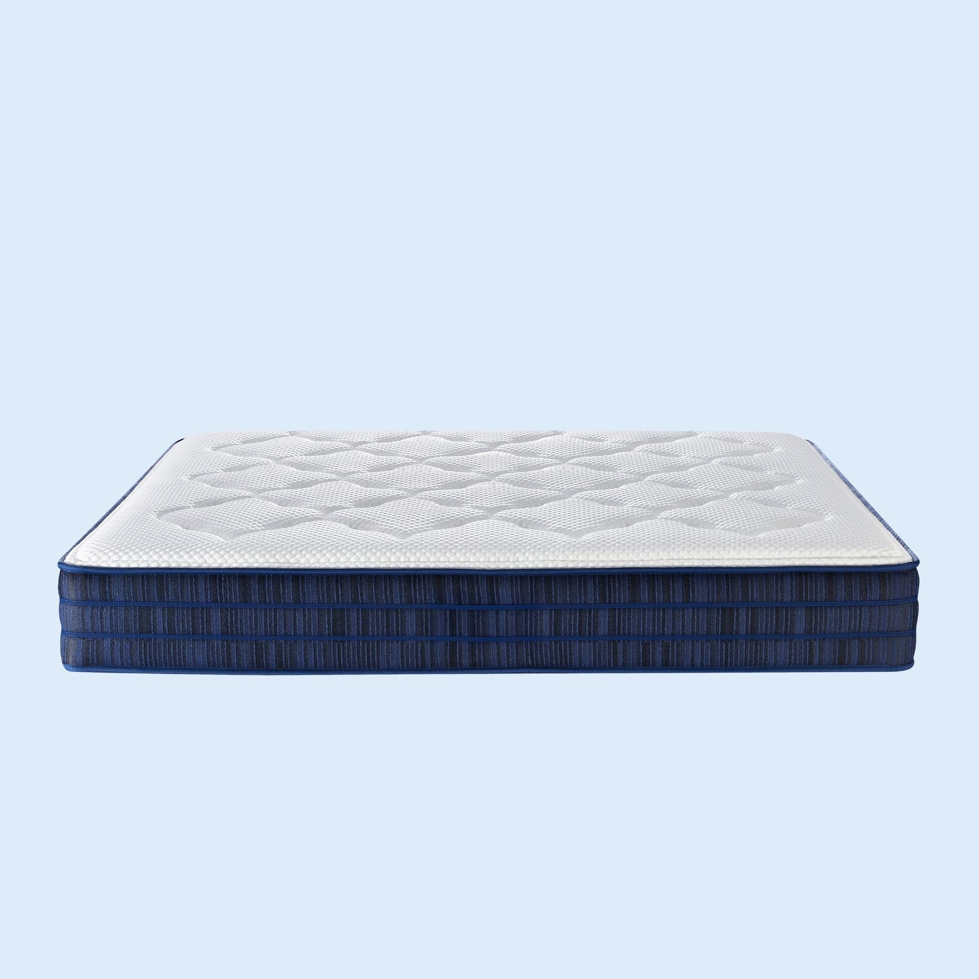 Mattress with blue exterior and white interior on a light blue background