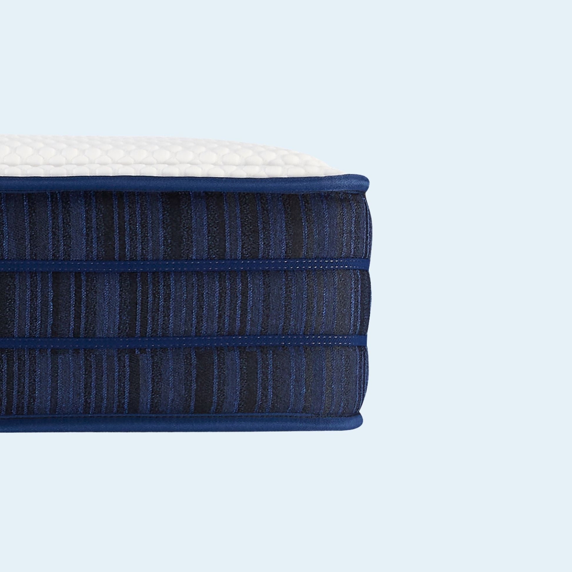 Close-up of a blue mattress on a white background