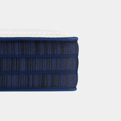 Blue mattress with textured surface on a white background