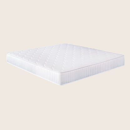 White mattress on a beige background