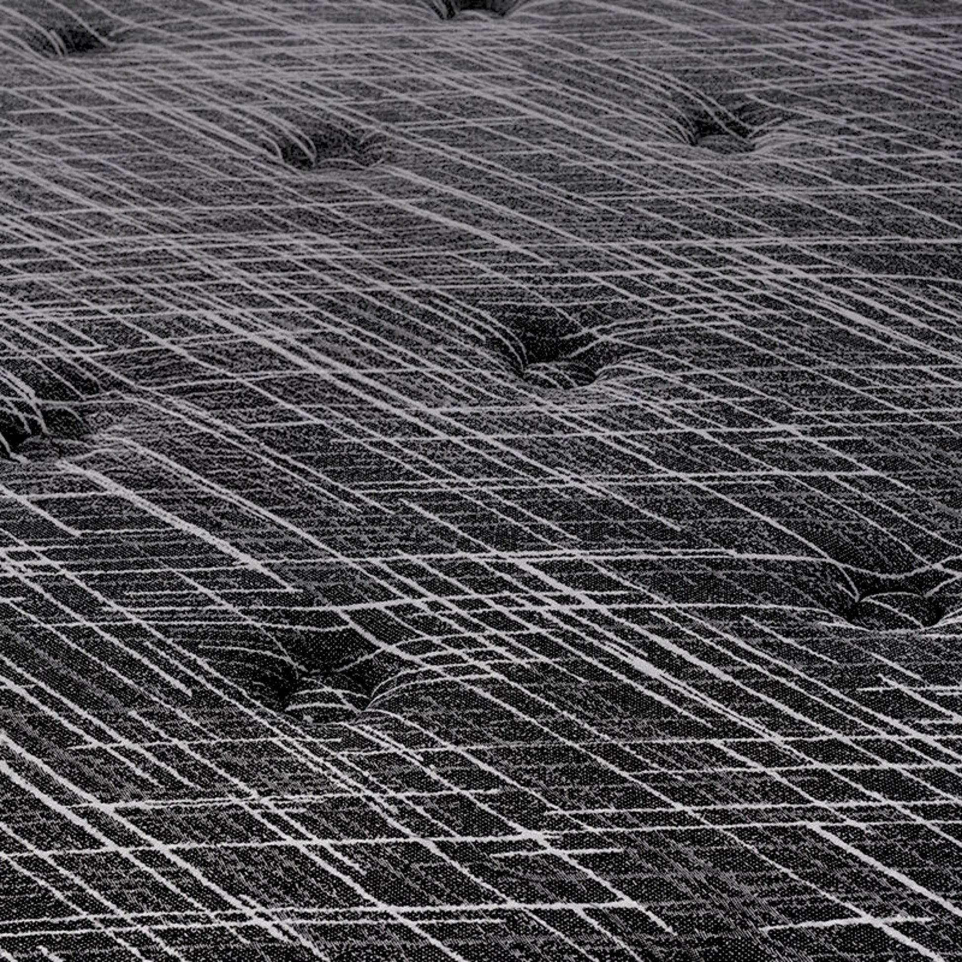 Close-up of a textured black and white patterned surface for mattress