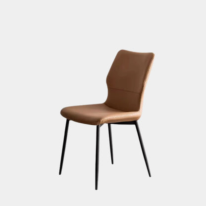 Brown leather chair with black legs on a light gray background
