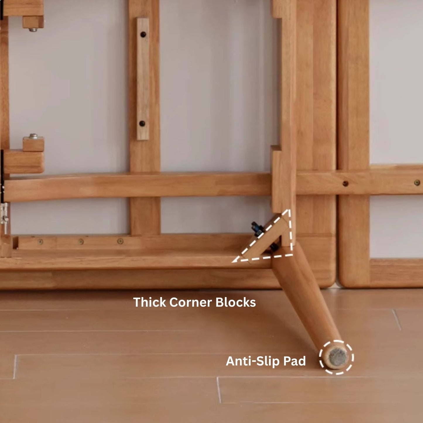 Wooden easel with thick corner blocks and anti-slip pad labeled