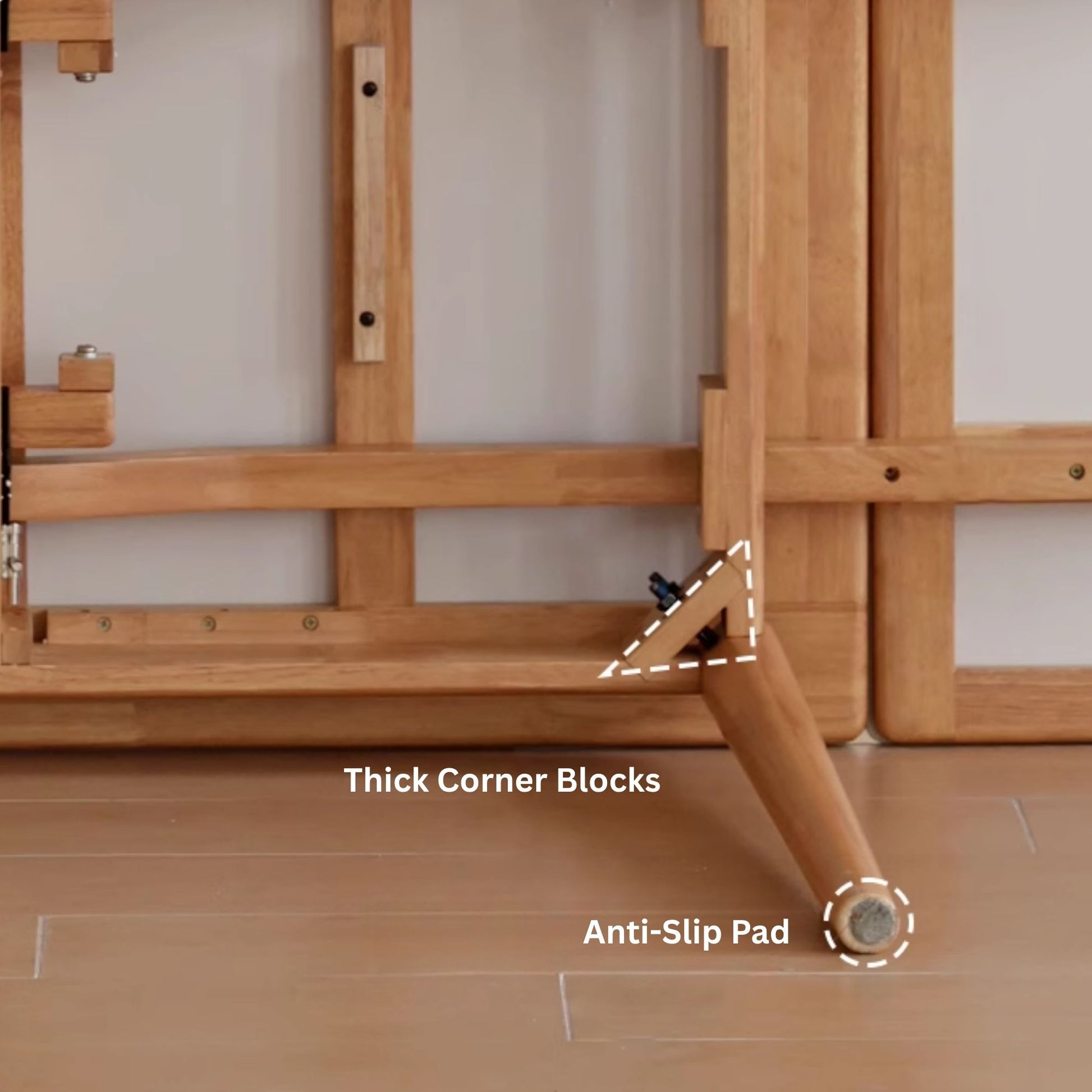 Wooden easel with thick corner blocks and anti-slip pad labeled