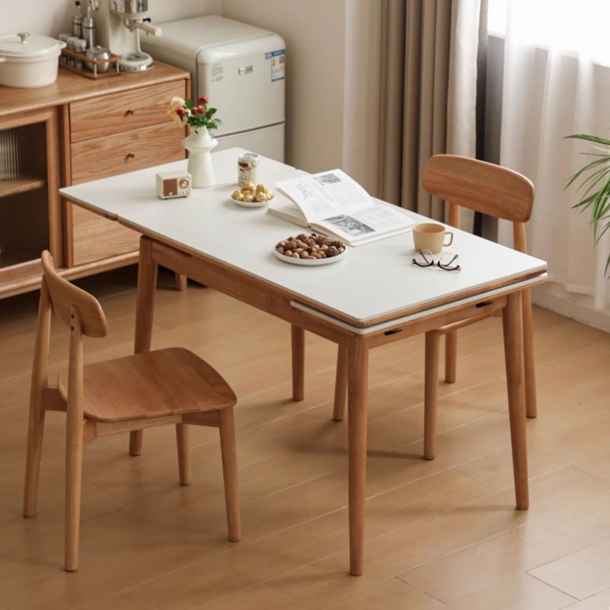 Dining table with chairs in a room setting